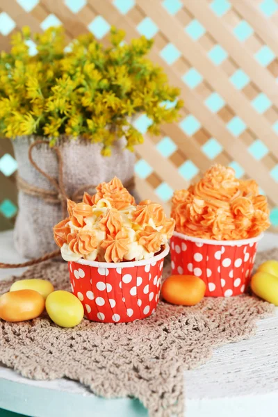 Tasty cupcakes on table — Stock Photo, Image