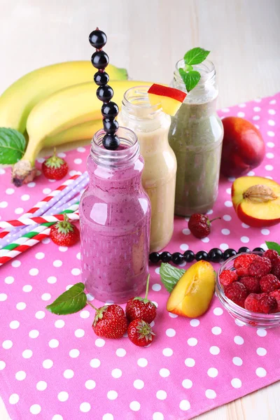 Bottles of delicious smoothie — Stock Photo, Image