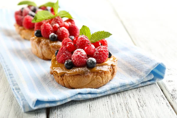 Sweet cakes with berries — Stock Photo, Image