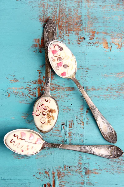 Spoons with tasty chocolate — Stock Photo, Image