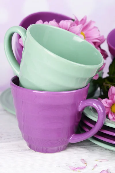 Bright cups and saucers — Stock Photo, Image