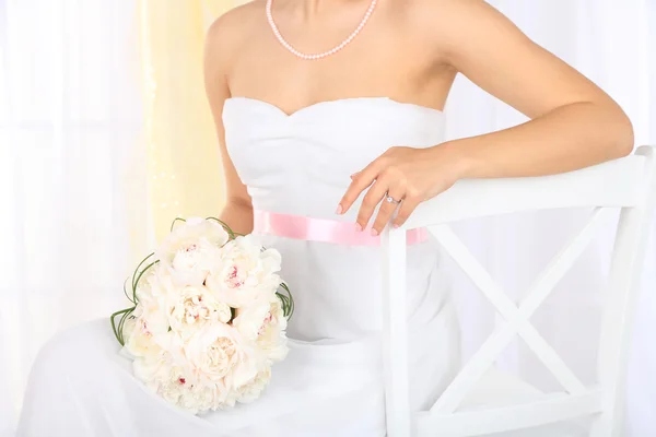 Bride holding wedding bouquet — Stock Photo, Image