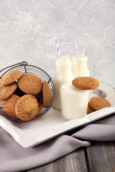 Milk and cookies on table — Stock Photo, Image