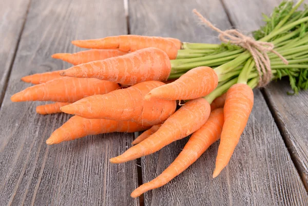 Fresh carrot with leaves — Stock Photo, Image