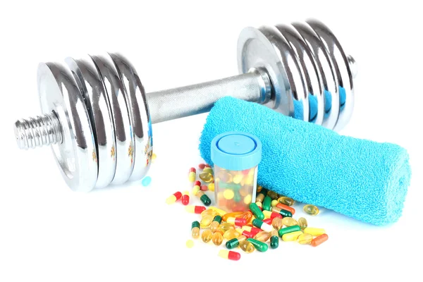Dumbbell e pillole colorate — Foto Stock