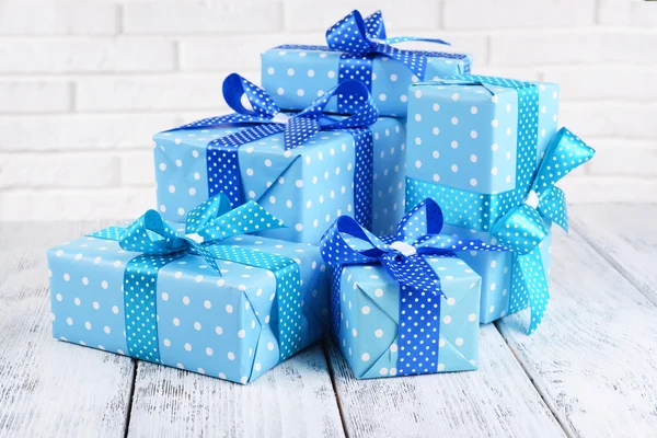 Beautiful gifts on table — Stock Photo, Image