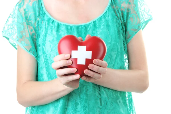 Červené srdce s kříž n rukou znamení — Stock fotografie