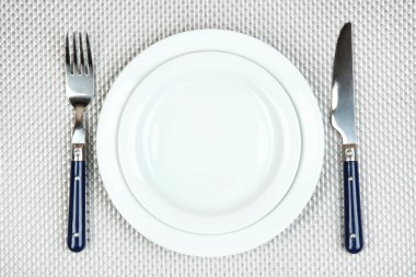 bıçak, renk tabak ve çatal, renkli arka plan üzerinde