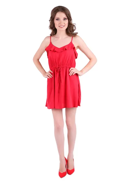Mooi meisje in een rode jurk geïsoleerd op wit — Stockfoto