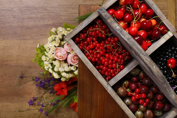 Fresh berries in wooden box — Stock Photo, Image