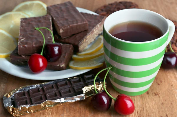 Cup of tea and sweets — Stock Photo, Image