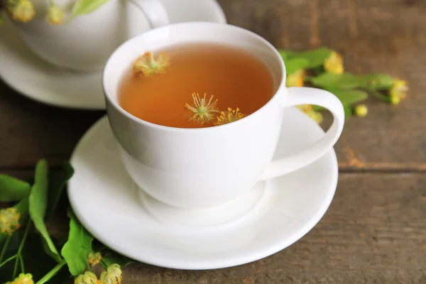 Tasty herbal tea with linden flowers — Stock Photo, Image