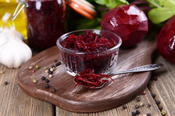 Grated beetroots in bow — Stock Photo, Image