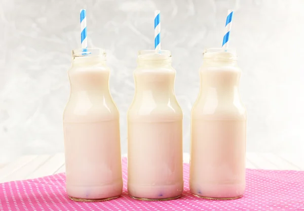 Milk in bottles — Stock Photo, Image