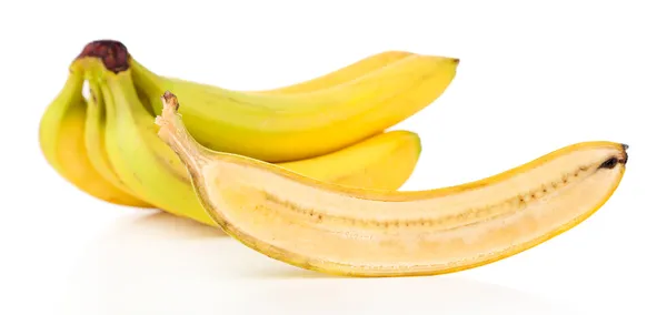 Halved and whole ripe bananas — Stock Photo, Image