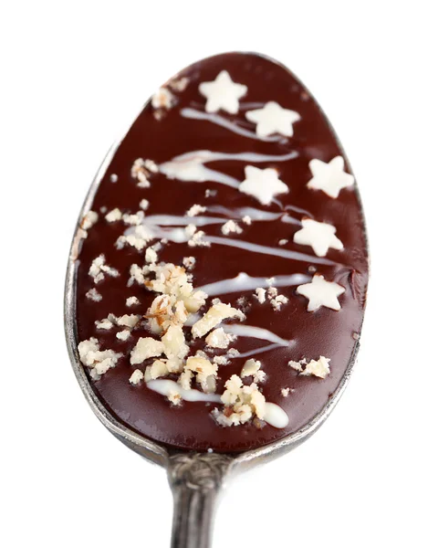 Spoon with tasty chocolate — Stock Photo, Image