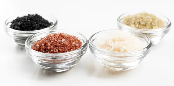 Different sea salt in bowls — Stock Photo, Image