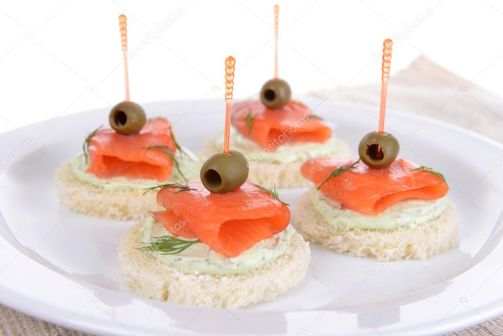 Delicious canapes on plate