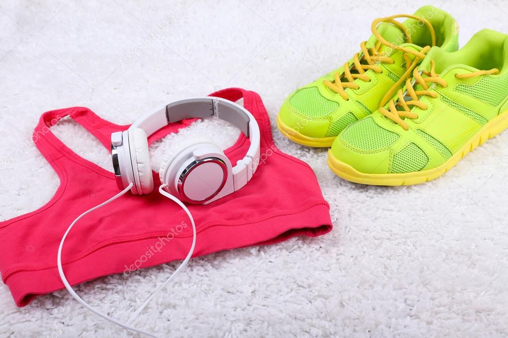 Sport clothes, shoes and headphones