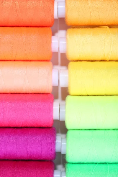 Multicolor sewing threads background — Stock Photo, Image