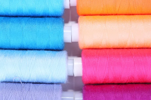 Multicolor sewing threads background — Stock Photo, Image