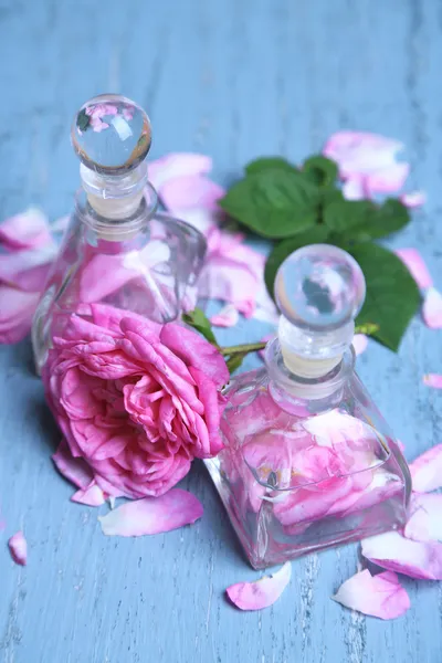 Rose oil in bottles — Stock Photo, Image