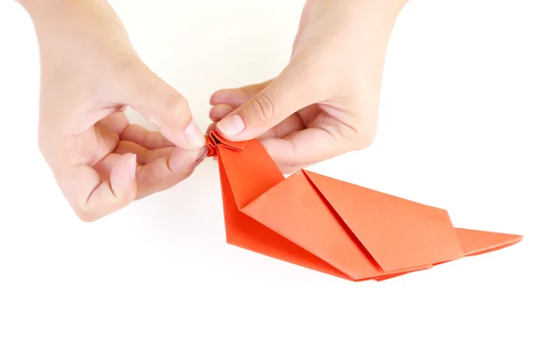 Hände basteln Origami-Vogel — Stockfoto