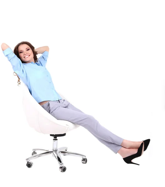 Young business woman sitting on chair isolated on white — Stock Photo, Image