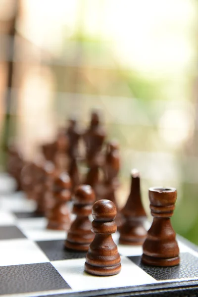 Quadro de xadrez com peças de xadrez — Fotografia de Stock