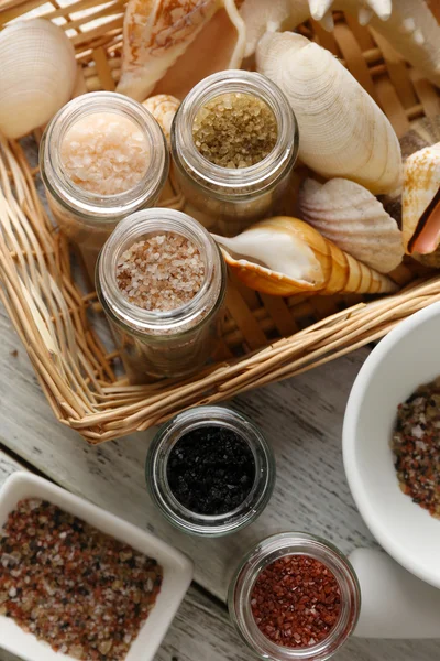 Different sea salt in bottles — Stock Photo, Image