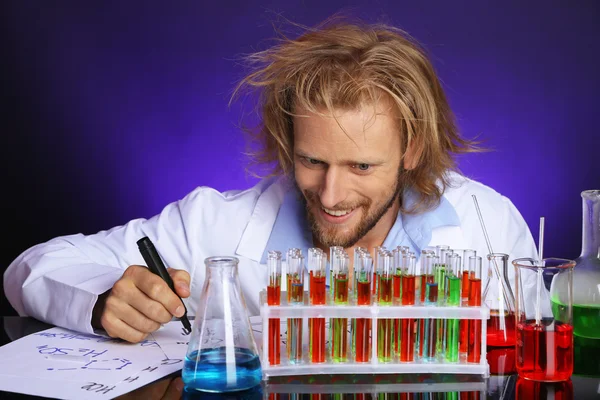 Crazy scientist in laboratory — Stock Photo, Image