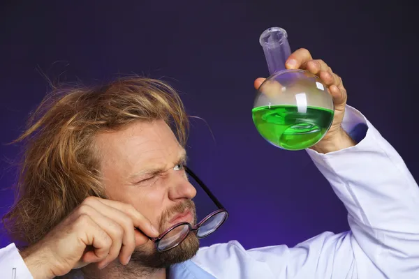 Crazy scientist in laboratory — Stock Photo, Image