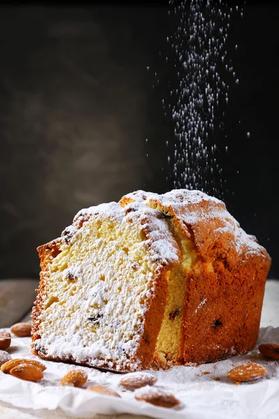 Tasty cake on table on grey background — Stock Photo, Image