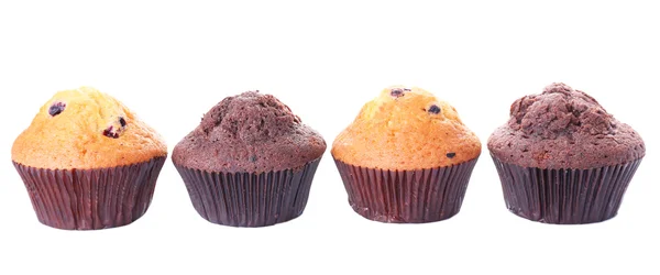 Smakelijke muffins geïsoleerd op wit — Stockfoto