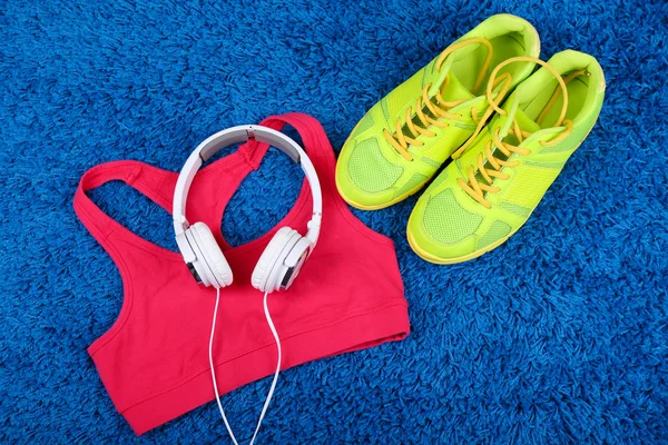 Sport clothes, shoes and headphones — Stock Photo, Image