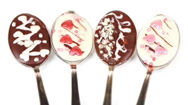 Spoons with tasty chocolate — Stock Photo, Image