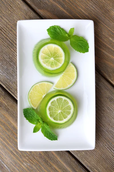 Green jelly with mint leaves — Stock Photo, Image