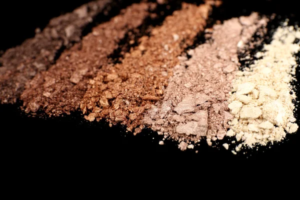 Crushed eyeshadow on black — Stock Photo, Image