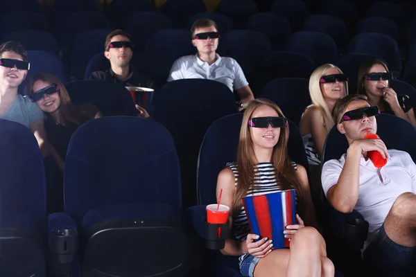 People watching movie in cinema — Stock Photo, Image