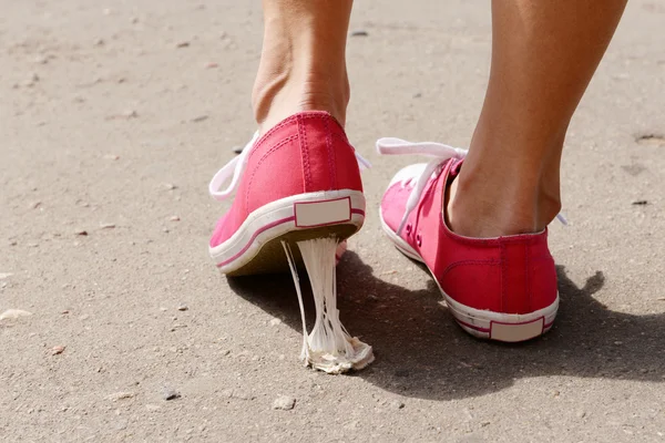 Foot stuck into chewing gum — Stock Photo, Image