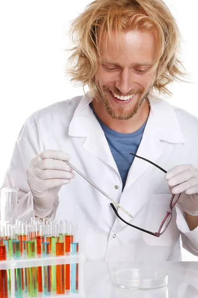 Crazy scientist with tubes — Stock Photo, Image