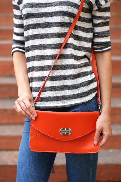 Girl with bag over shoulder — Stock Photo, Image