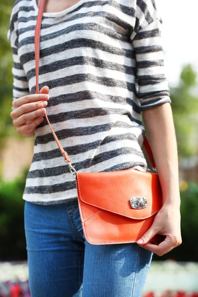 Girl with bag over shoulder — Stock Photo, Image