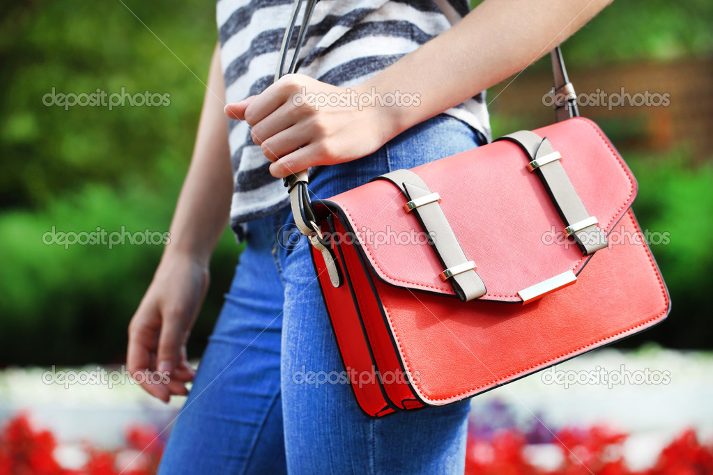 Girl with bag over shoulder Stock Photo by ©belchonock 50272069