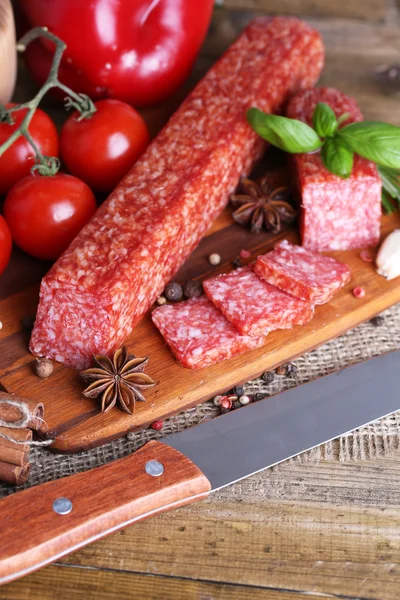 Salami sausage and spices — Stock Photo, Image