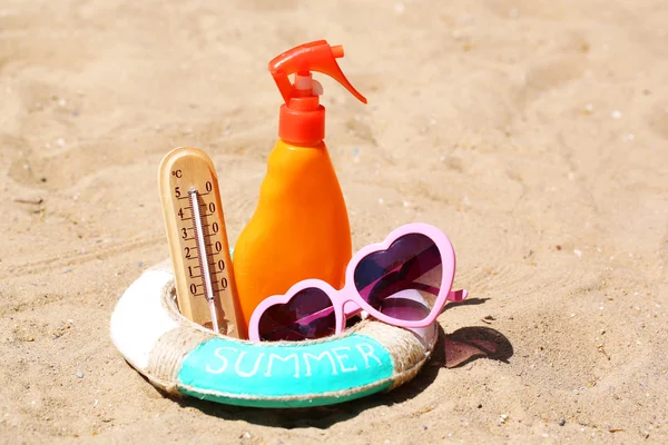 Thermometer in summer sand — Stock Photo, Image