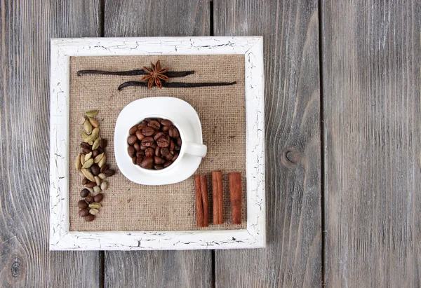 Wooden frame with white mug — Stock Photo, Image