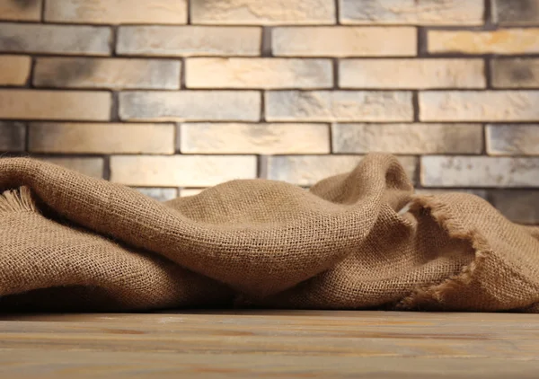 Wooden table with cloth