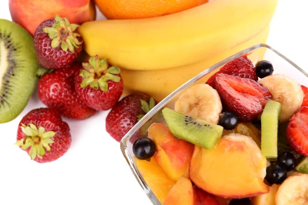 Fruits salad in bowl with fruits and berries — Stock Photo, Image