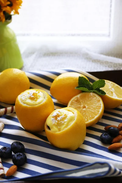 Tasty lemon desserts on napkin — Stock Photo, Image